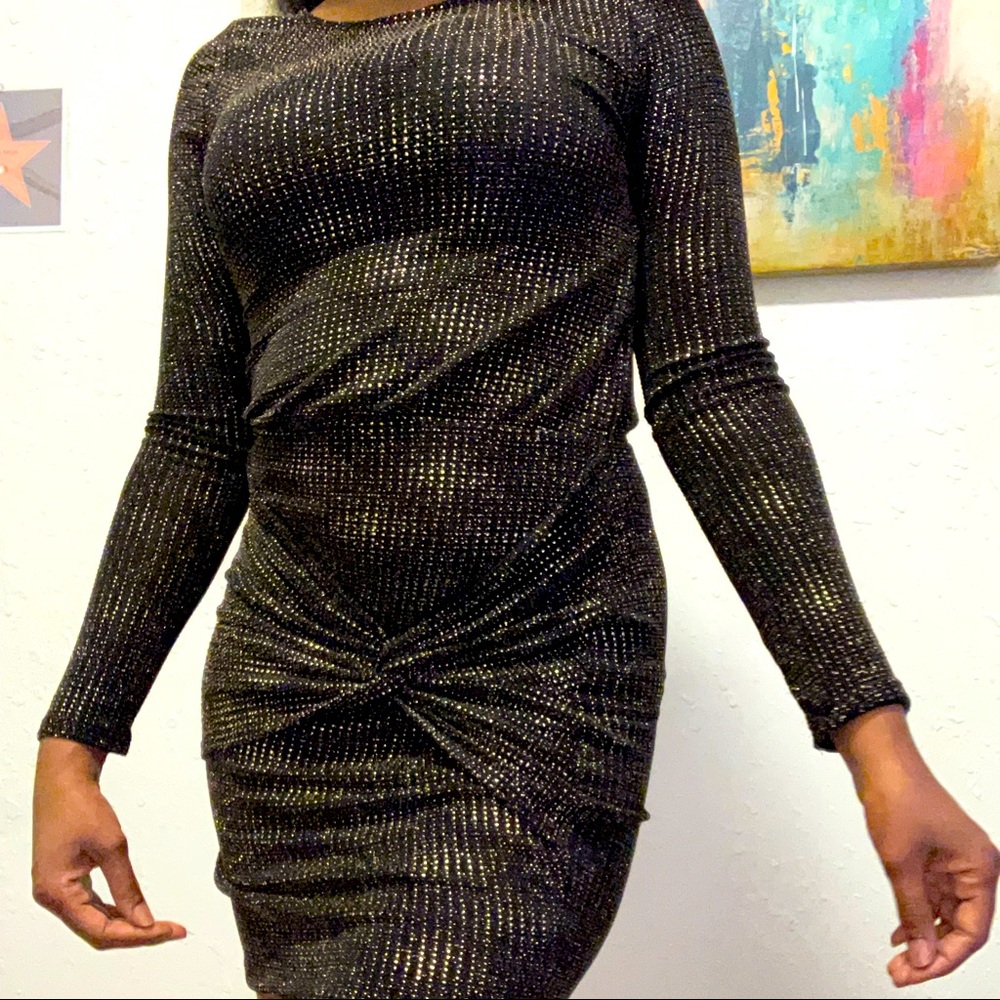 Black and gold dress from Akira Shops, size S but nice stretch so maybe M too.
